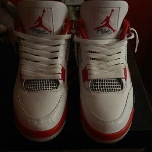 Fire red Jordan 4s